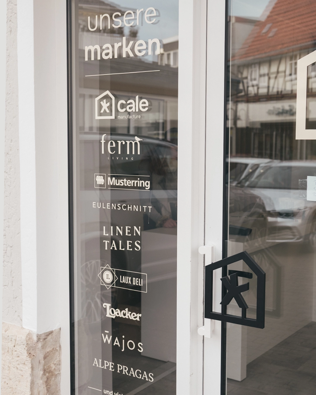 cale design - Showroom Window Vinyl with Brand Overview