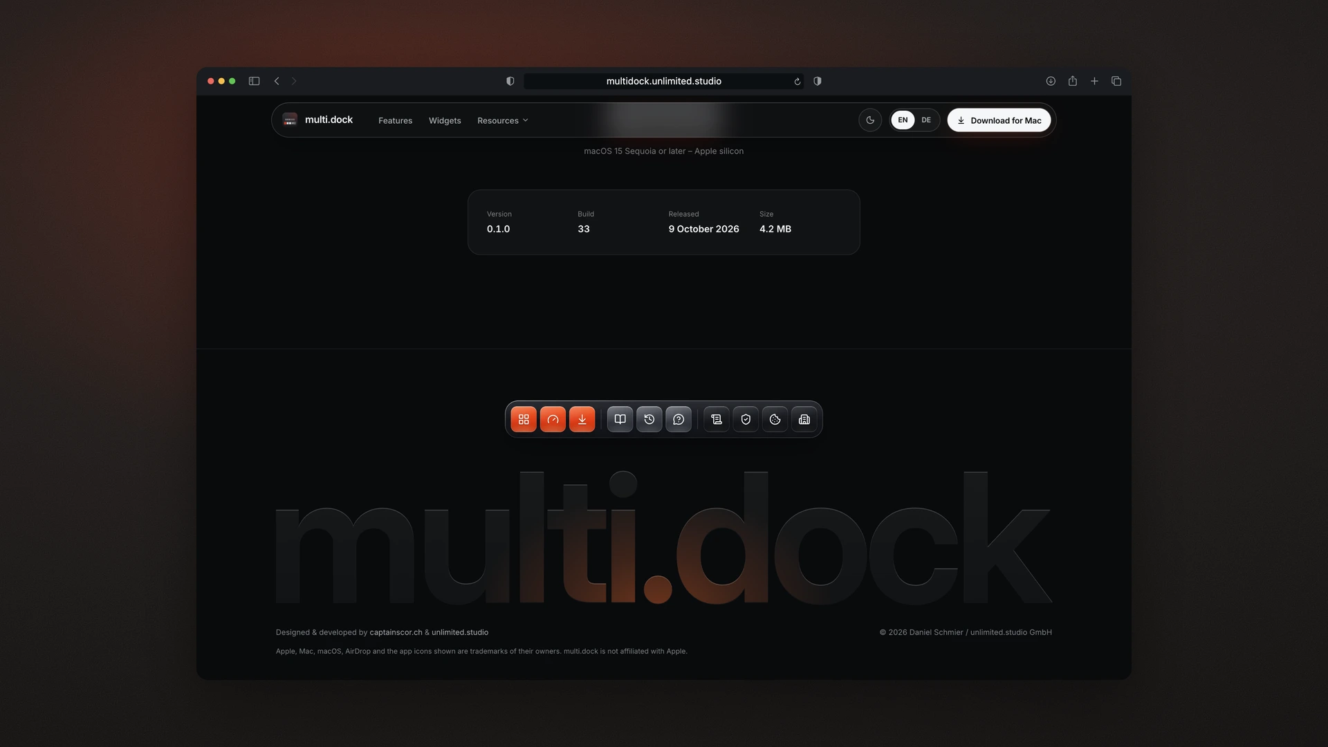 multi.dock - Desktop Footer Dock with Magnification and the Ember Light Following the Pointer through the Wordmark